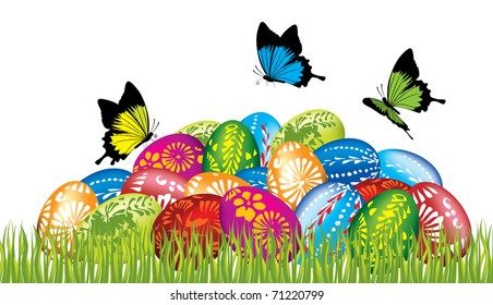Easter eggs in the grass with butterflies