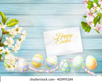Easter eggs, greeting card and cherries blossom on a old wooden background. EPS 10 vector file included