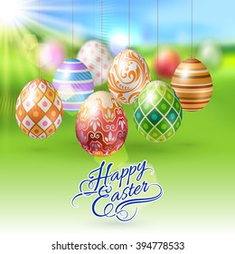 Easter Eggs Hanging on a String on Green Blur Background with Sun Light