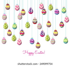 easter eggs hanging on the wire background