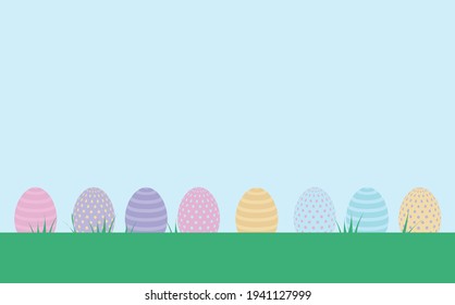 easter eggs on grass with blue sky