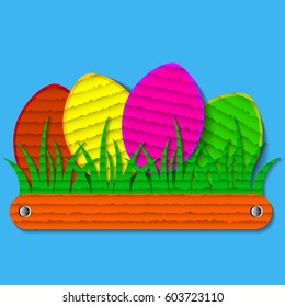 Easter eggs on the grass in paper style