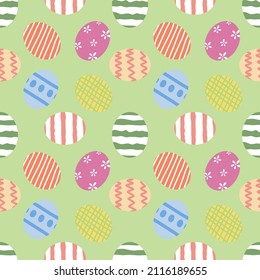Easter eggs on a green background. Colorful Easter egg pattern. Easter egg pattern. Patterns for decoration. Hand drawn vector. Seamless pattern. Decorate the wrapping paper.