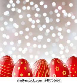 Easter eggs on shiny background