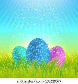 Easter eggs on a shiny grass