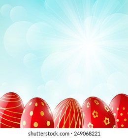 Easter eggs on sunny background