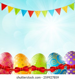Easter eggs on sunny background