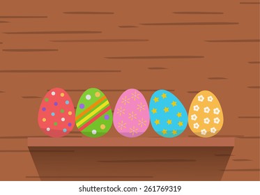Easter eggs on wood background vector 