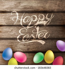 Easter eggs on wooden background 