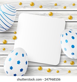 Easter eggs on wooden background