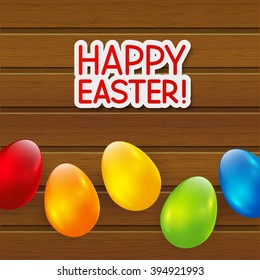Easter eggs on wooden background