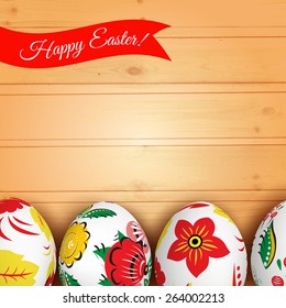 Easter eggs on the wooden texture. Vector. Holiday background. Russian painting