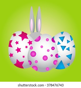 Easter eggs painted rabbit ears set on a green background
