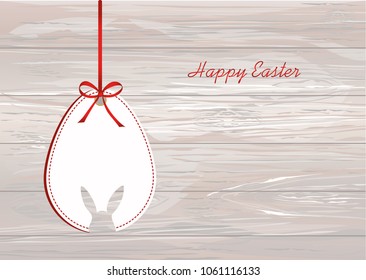 Easter eggs from paper hang on a tape with bows. Greeting card or invitation for a holiday. Free space for text. Vector on wooden background.