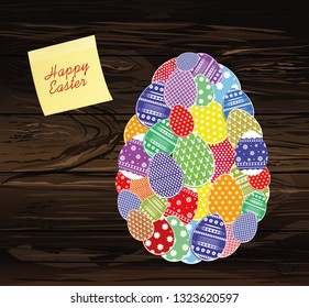 Easter eggs with a pattern in the shape of an oval.  Empty Yellow sheet of paper for notes. Sticker. Greeting card for the holiday. Free space for text. Vector on wooden background