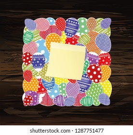 Easter eggs with a pattern in the shape of an square.  Empty Yellow sheet of paper for notes. Sticker. Greeting card for the holiday. Free space for text. Vector on wooden background.