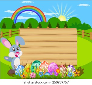 The Easter with eggs, rabbit  and wood sign board