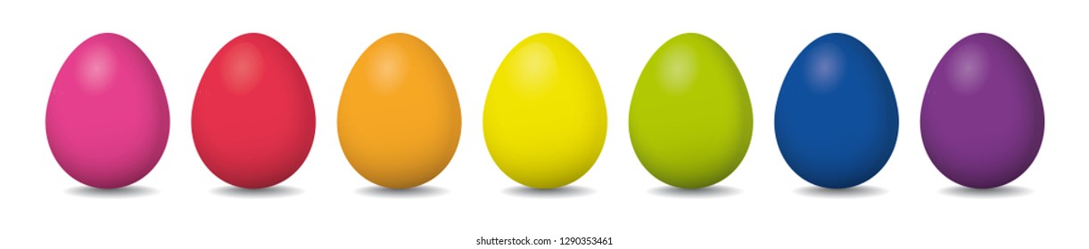 Huevos de Pascua con colores arcoiris sobre fondo blanco