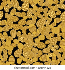 Easter eggs randomly placed on black background. Decorative seamless pattern. Wrapping or greeting card texture. Vector eps8 illustration in golden tones.