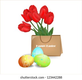 easter eggs with red tulip flowers isolated on white background
