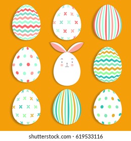 Easter eggs set collection and bunny on orange background, vector illustration.