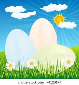 Easter eggs and white flowers in the grass under sun-rays