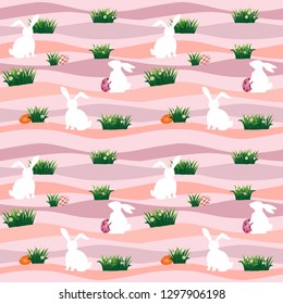 Easter eggs with white rabbits in the meadow seamless pattern on pastel background for happy holiday,fabric,textile,print or wrapping paper