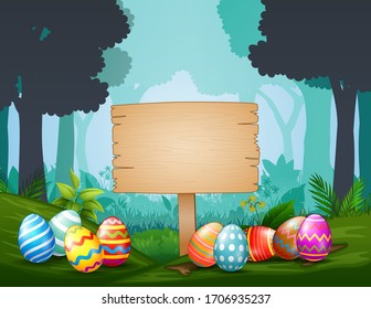 Easter eggs with wooden sign  in the middle of dark forest