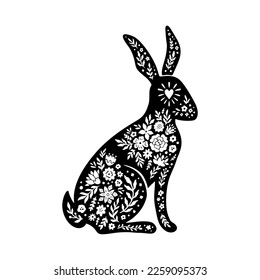 Easter floral rabbit silhouette in linocut style. Cute bunny shape, flower, leaves. Vector folk art illustration isolated on white background. Bloom linocut rabbit icon for logo, social media, print.