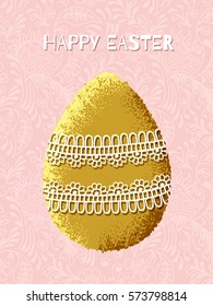 Easter gold egg decorated with an openwork pattern on background.Greeting card.