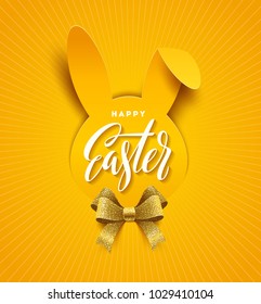 Easter greeting card. Easter calligraphic greeting on a paper silhouette of rabbit head and glitter golden ribbon bow. Vector illustration.
