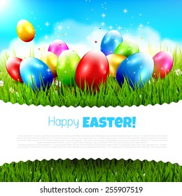 Easter greeting card with colorful eggs in the grass and with place for your text