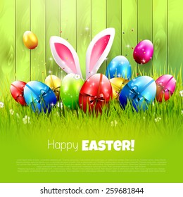 Easter greeting card with colorful eggs on wooden background