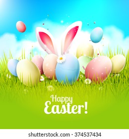 Easter greeting card with colorful eggs and bunny ears in the grass