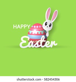 Easter greeting card with colorful eggs and bunny on green background