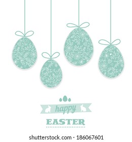 Easter greeting card with eggs. Hanging Easter eggs