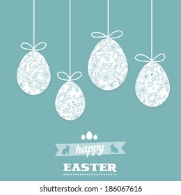 Easter greeting card with eggs. Hanging Easter eggs