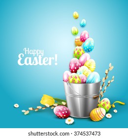 Easter greeting card with flowers and colorful eggs in the bucket
