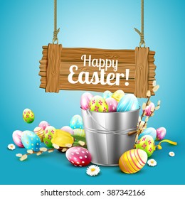 Easter greeting card with flowers and colorful eggs in the bucket and wooden sign on blue background