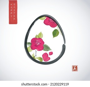 Easter greeting card in minimal japanese style with camelia flowers in the egg on white background. Traditional oriental ink painting sumi-e, u-sin, go-hua. Translation of hieroglyph - beauty