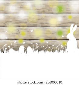 Easter greeting card with rabbit, eggs and lights on the wooden background. Eps 10 vector file.