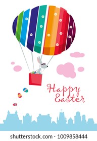 Easter greeting card. A rabbit is flying in a balloon over the city. Vector illustration