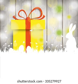 Easter greeting card with rabbit, gift and lights on the wooden background. Eps 10 vector file.