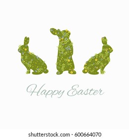 easter greeting card with rabbits made of flowers and leaves with greeting text