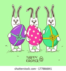 Easter greeting card with three cartoon funny bunny rabbits holding colorful big eggs