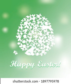 Easter greeting green shining card with paper cutting decorative egg with bunny
