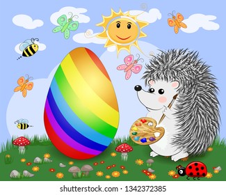 Easter hedgehog with a brush and a palette paints huge Easter egg on a glade, the sun, butterflies, spring. Copy space