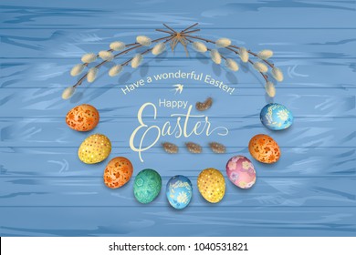 Easter holiday background with painted eggs and pussy willow branches
