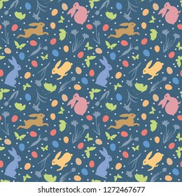 Easter Holidays seamless vector pattern with bunnies, flowers, butterflies and eggs on blue background