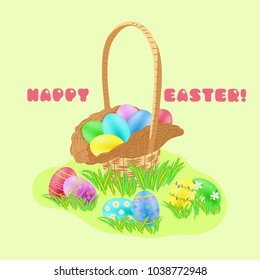 Easter hunt concept with painted eggs in the wicker basket in green grass